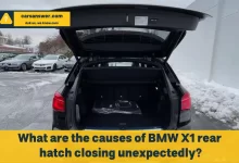 What are the causes of BMW X1 rear hatch closing unexpectedly?